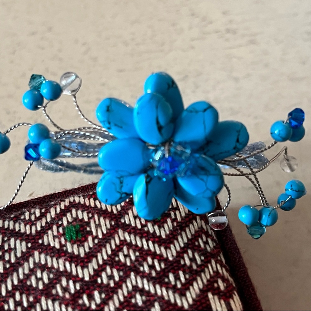 Handmade in Bangkok turquoise and blue beaded floral bracelet.